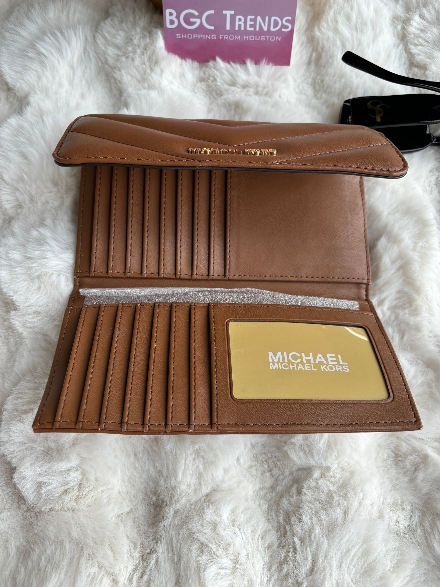 Cartera Michael K café acolchonada