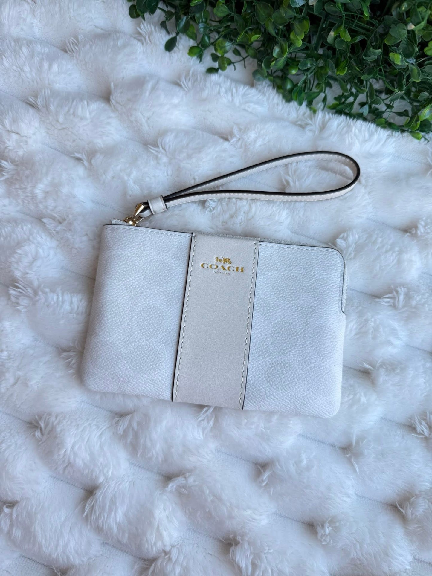 Muñequera Coach blanca/crema, monogram y strap
