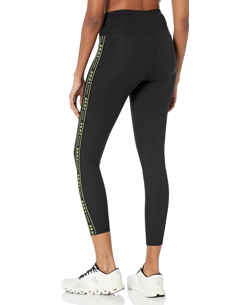Leggings DKNY negro, letras verde neón en costados
