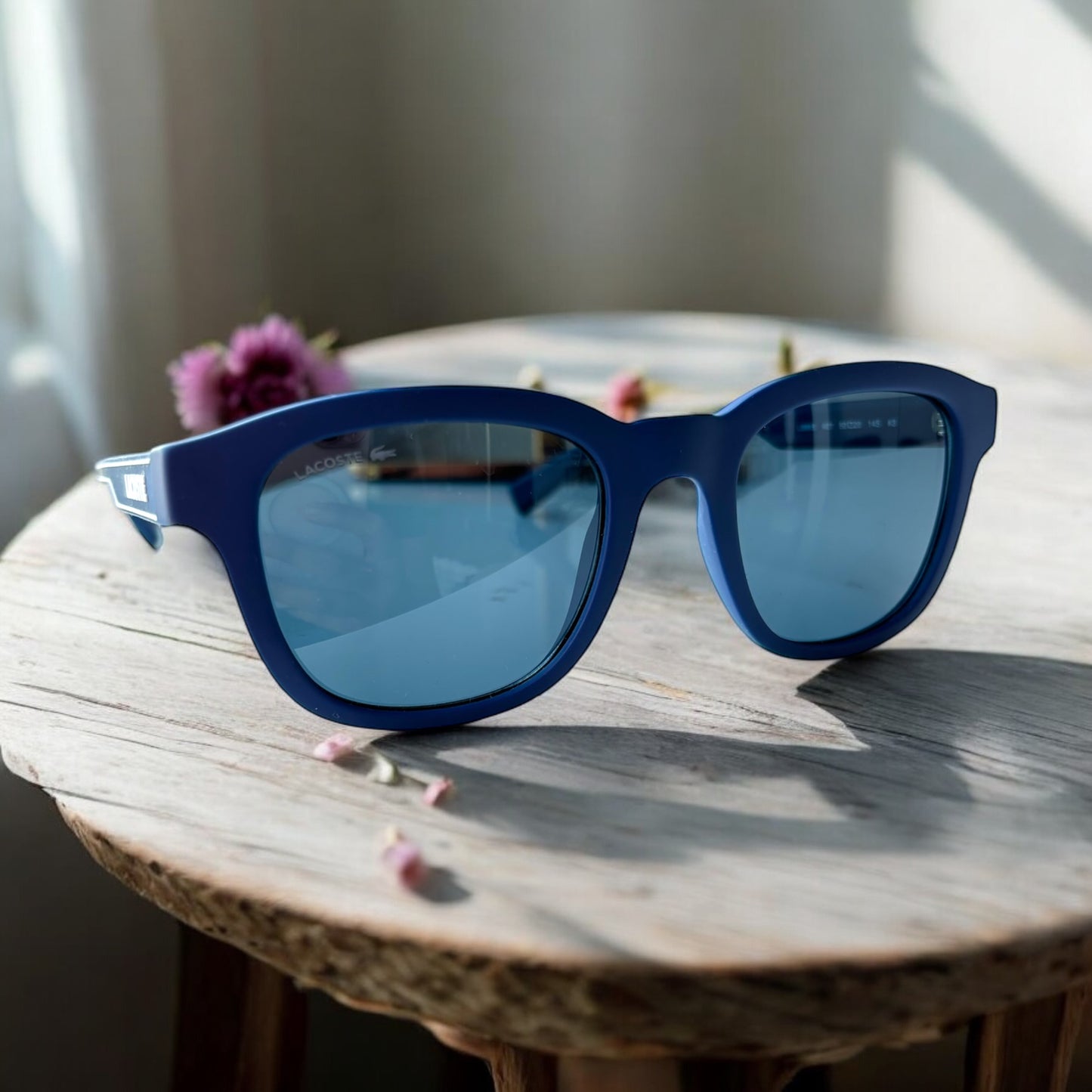 Lentes Lacoste azul con letras blancas para caballero