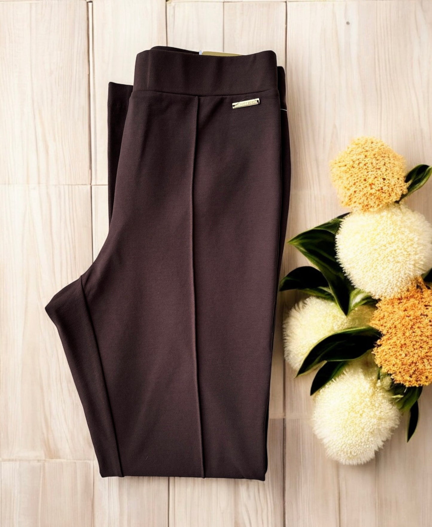 Leggings Michael K chocolate con placa