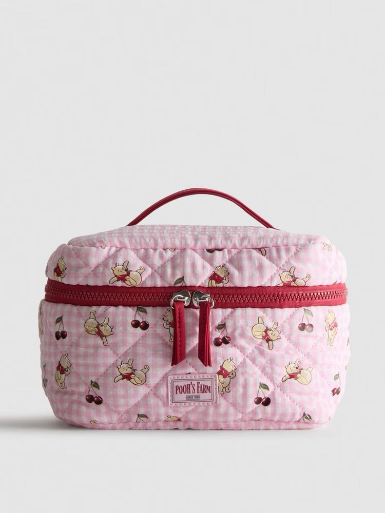 Cosmetiquera Primark de Disney Winnie Pooh rosa con rojo