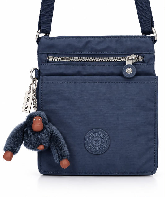 Crossbody Kipling azul marino con changuito