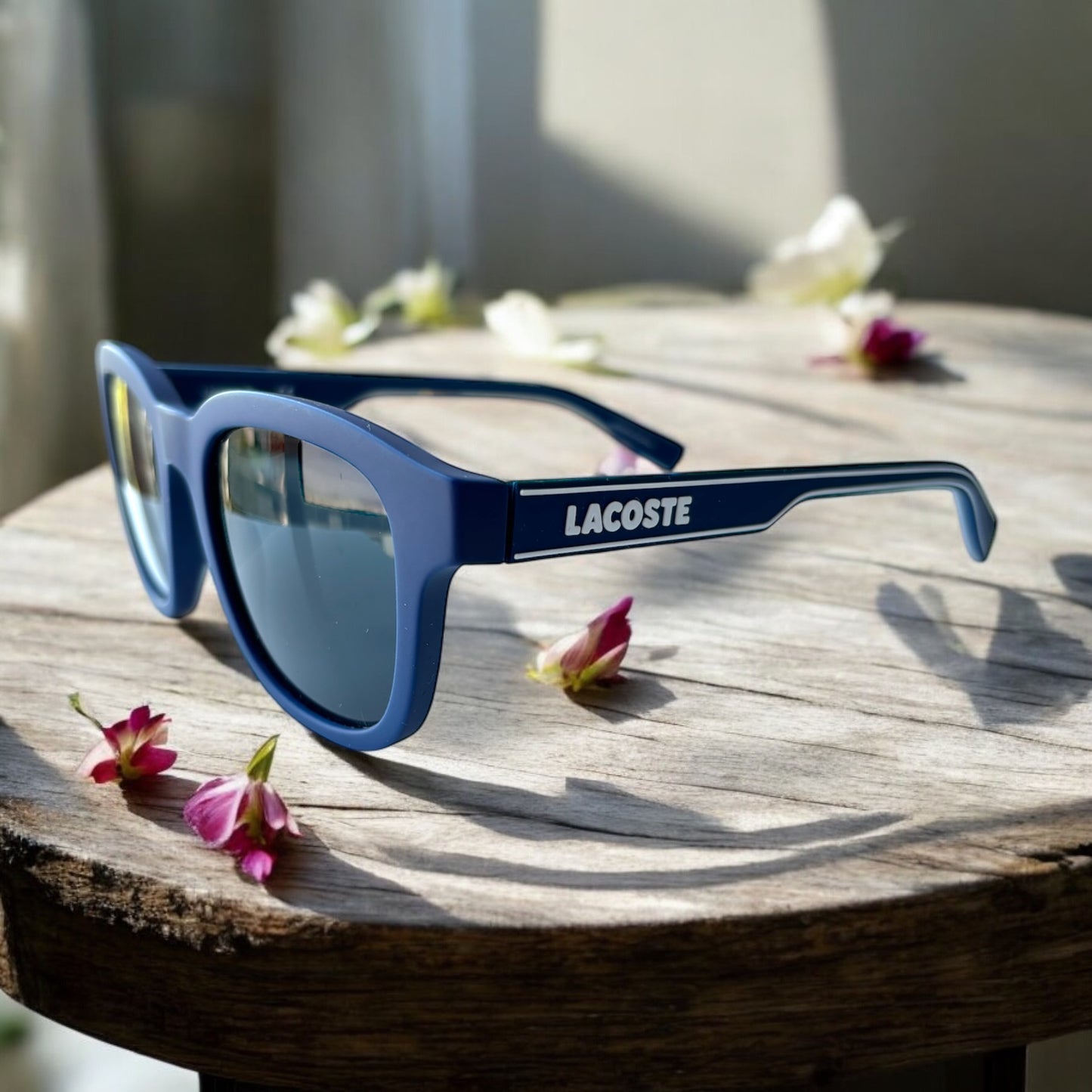 Lentes Lacoste azul con letras blancas para caballero
