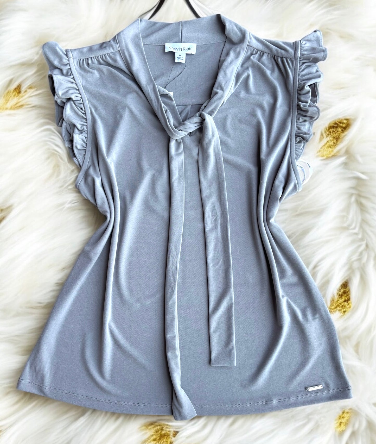 Blusa Calvin K gris con cinta