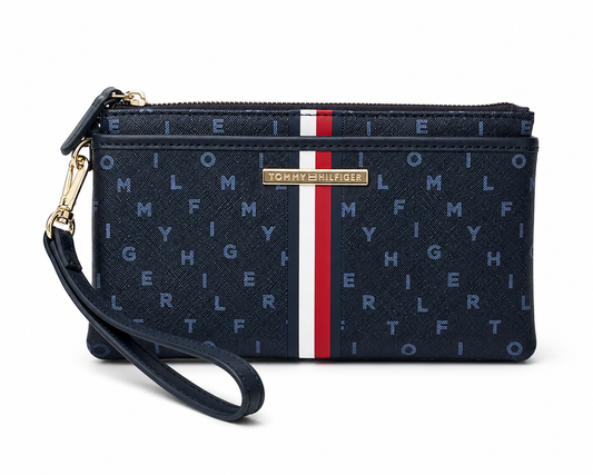 Muñequera Tommy H azul marino con monogram de letras y doble cierre