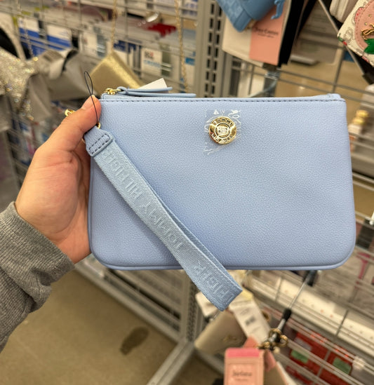 Muñequera Tommy H azul con strap grabado y placa plateada