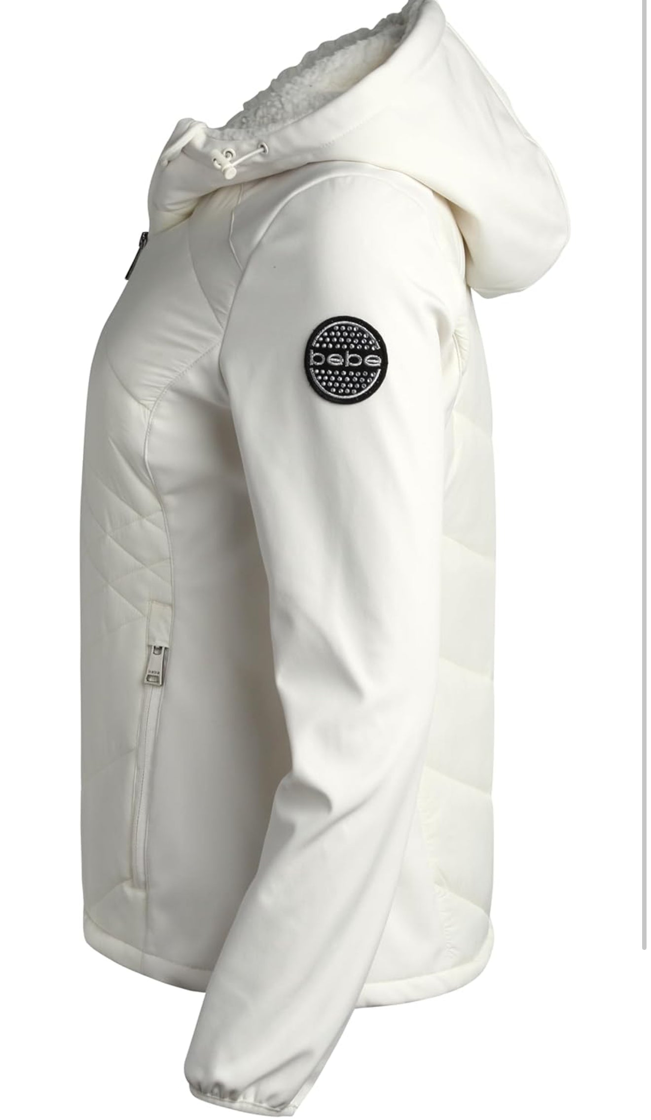 Chamarra Bebe crema capitonadalisa, gorrito afelpado y placa negra con brillos