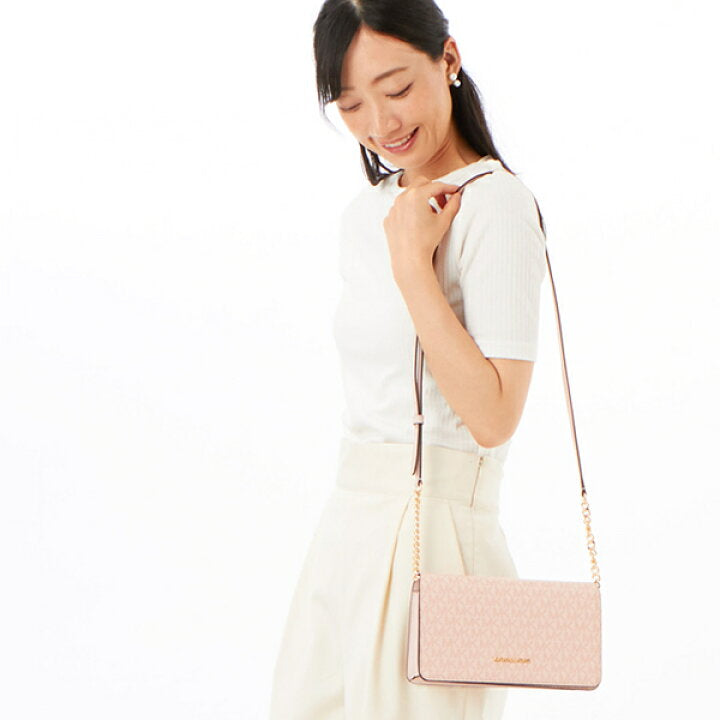 Crossbody Michael K rosa con monogram
