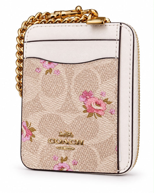 Monedero Coach beige con flores