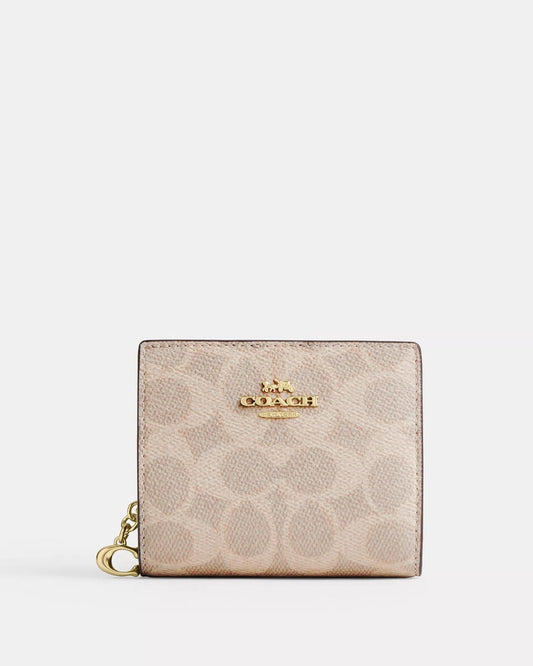 Cartera Coach beige snap Wallet in signature canvas