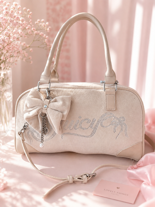 Crossbody Juicy C beige de terciopelo con moño