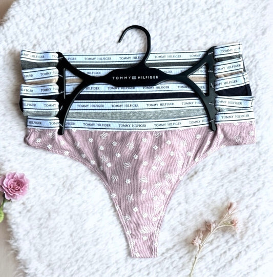 Tangas Tommy H varios colores, resorte blanco con letras negras 5pzs
