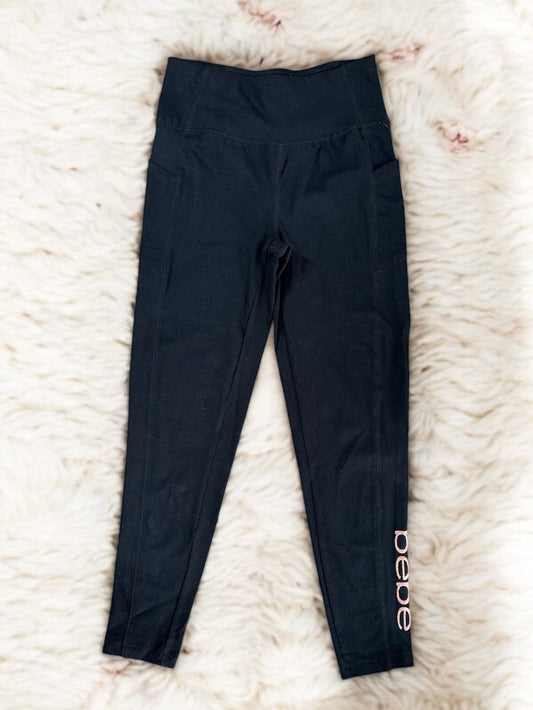 Leggings Bebe negro, con letras rose gold