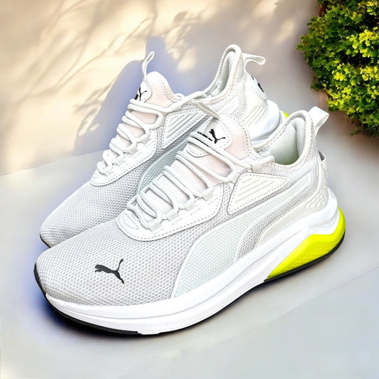 Tenis Puma gris suela con detalle amarillo neón