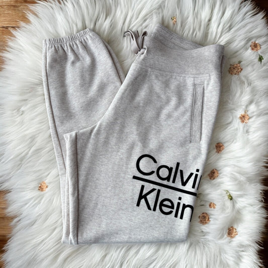 Pants Calvin K beige con letras negra
