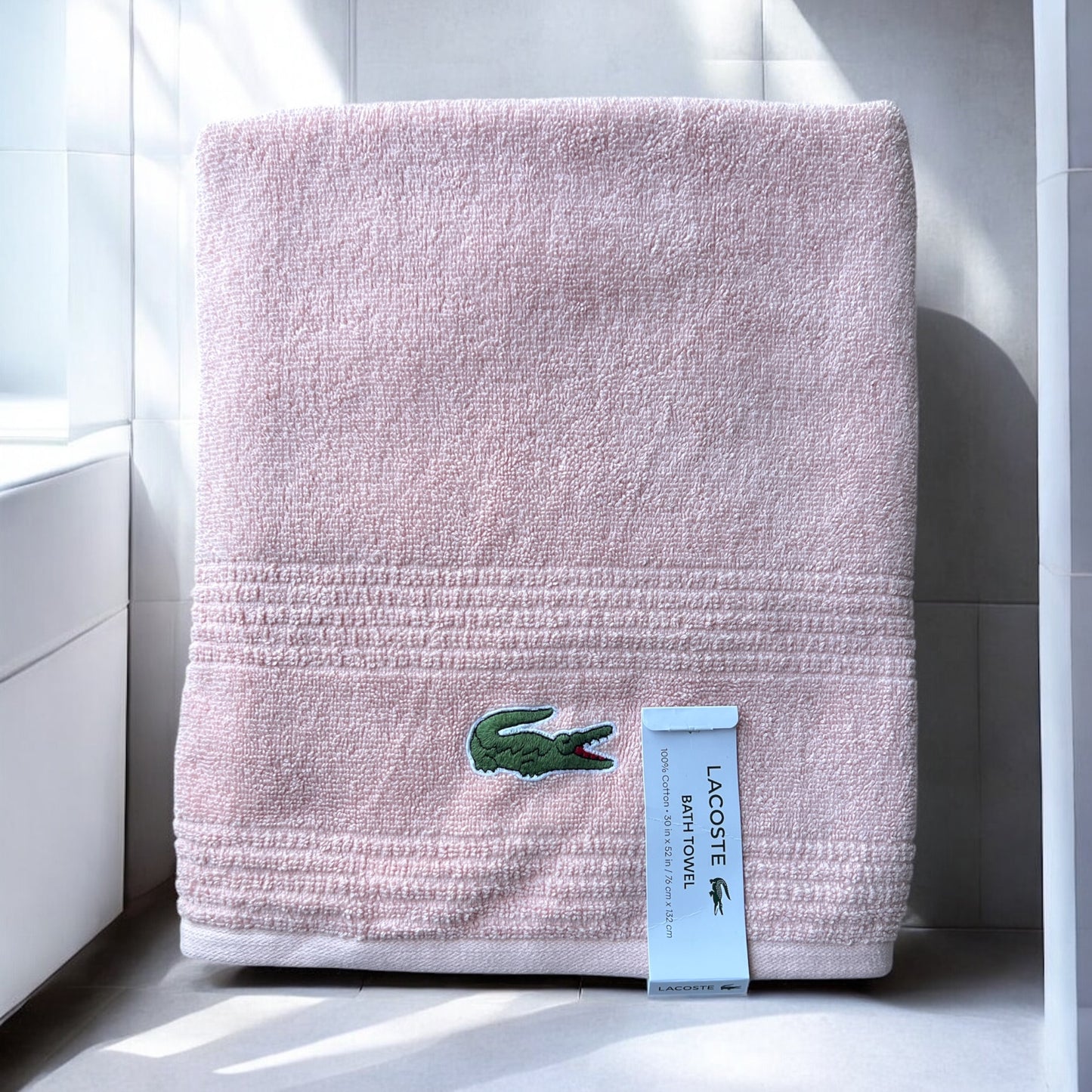 Toalla Lacoste rosa claro