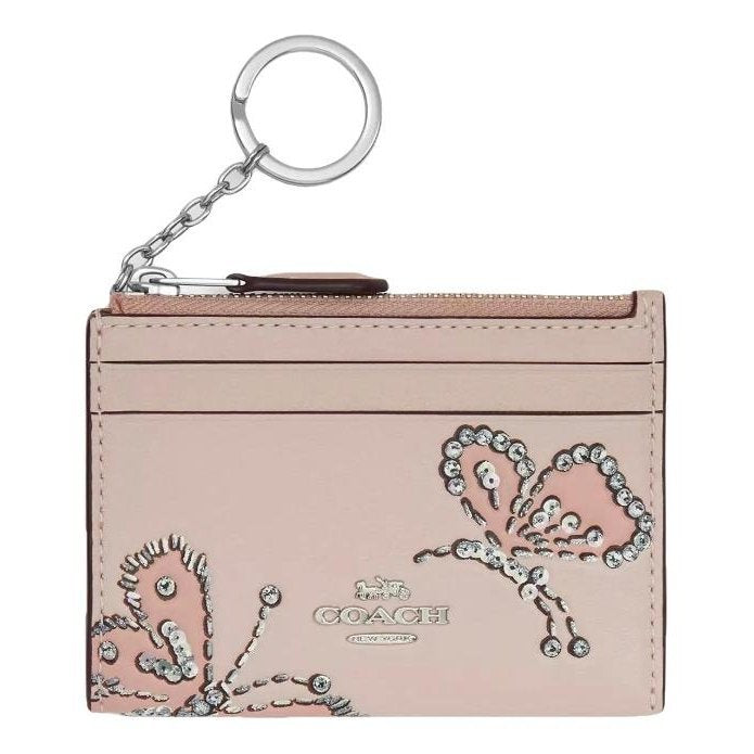 Tarjetero Coach rosa de mariposa