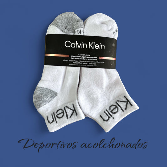 Tines Calvin K, blancos letras en tobillo y al frente