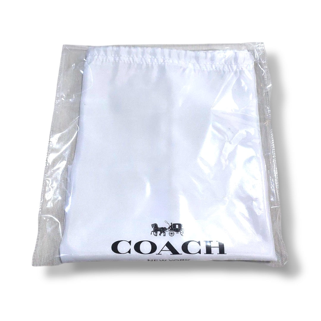Bolsa Cubre Polvo Coach blanca, cinta