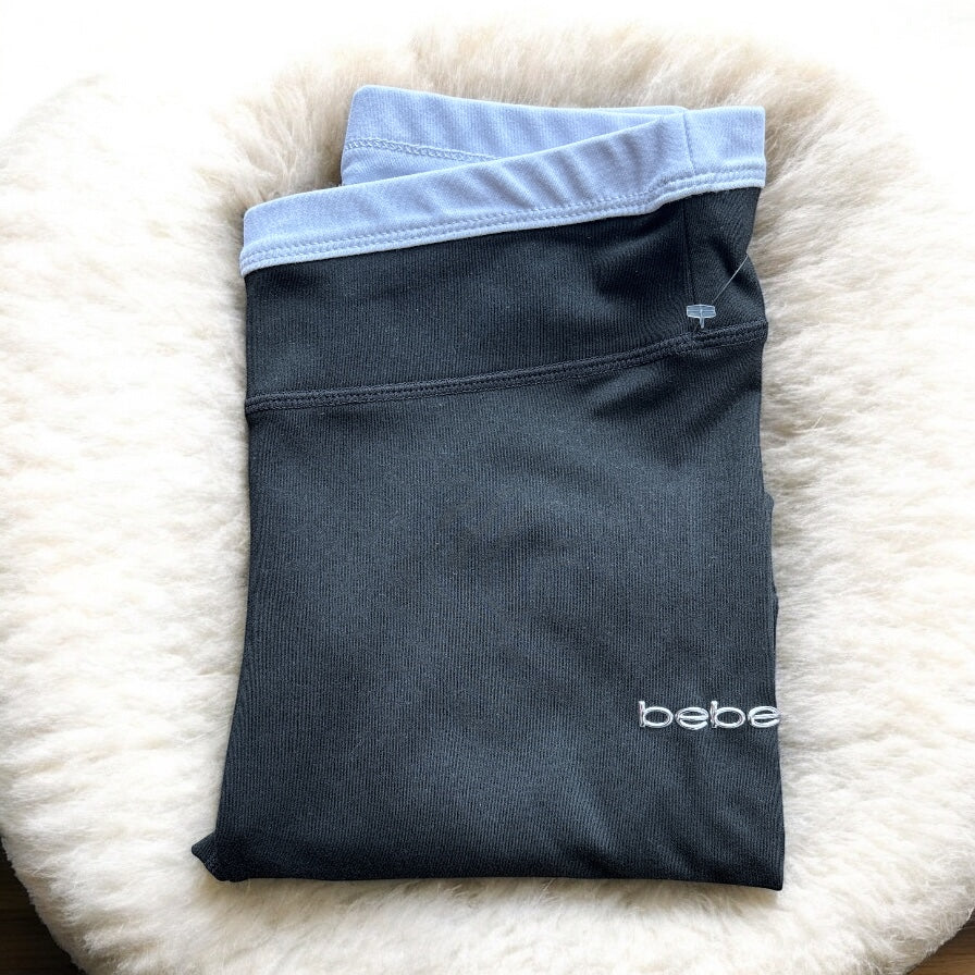 Leggings Bebe negro letras con cintura color blanco