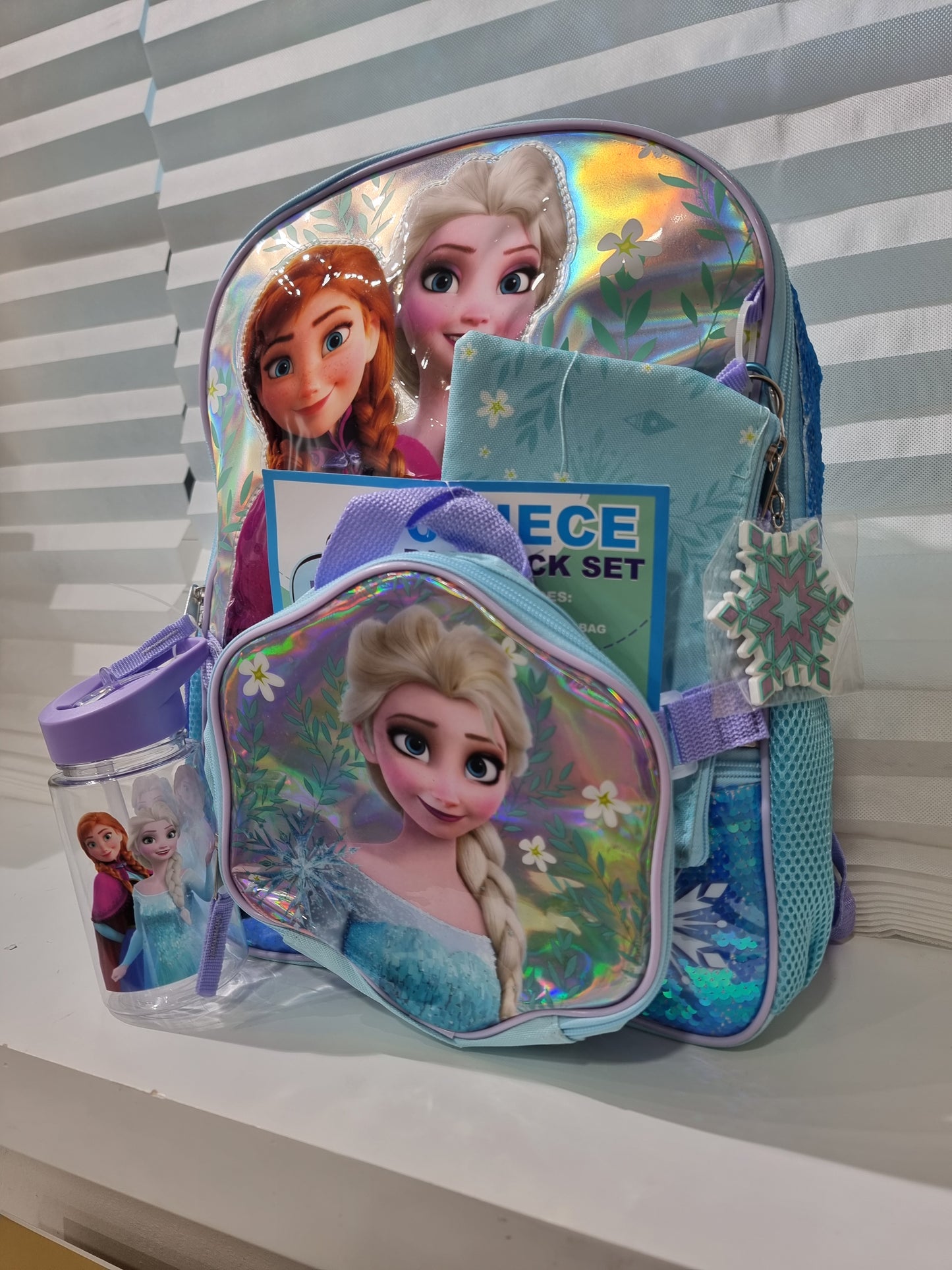 Backpack Disney azul de Frozen con lapicera, lonchera y vaso para agua