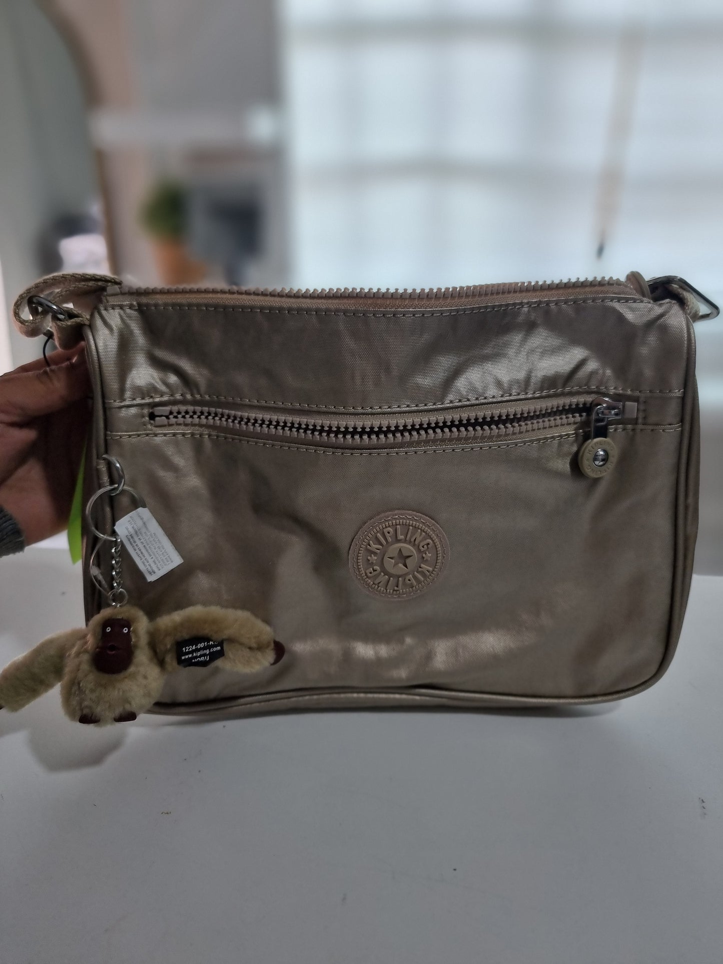 Crossbody Kipling dorada